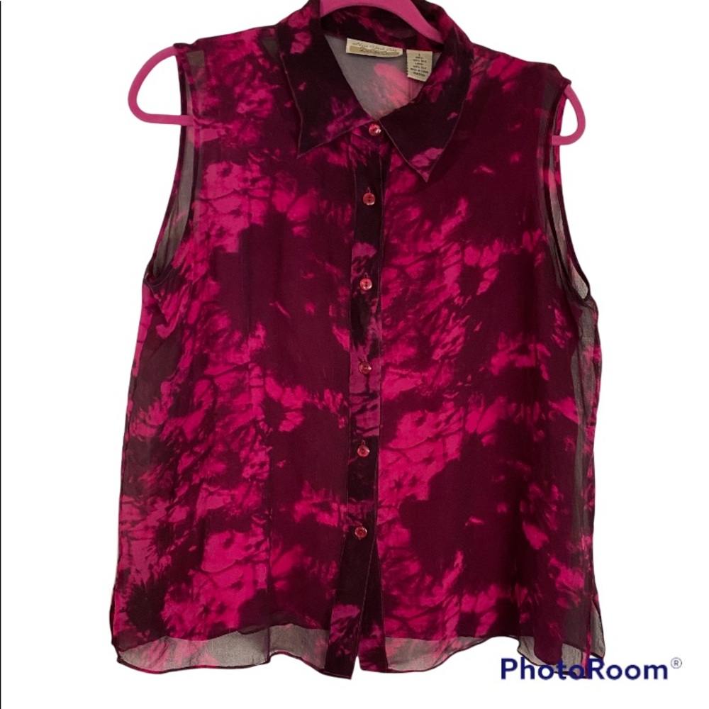 100% silk button down top, lining and shell.